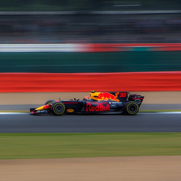Formula 1 driver Max Verstappen racing on a track