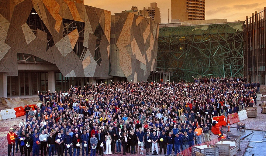 A photo of all staff from Fed Square in 2002 just before the opening of the site