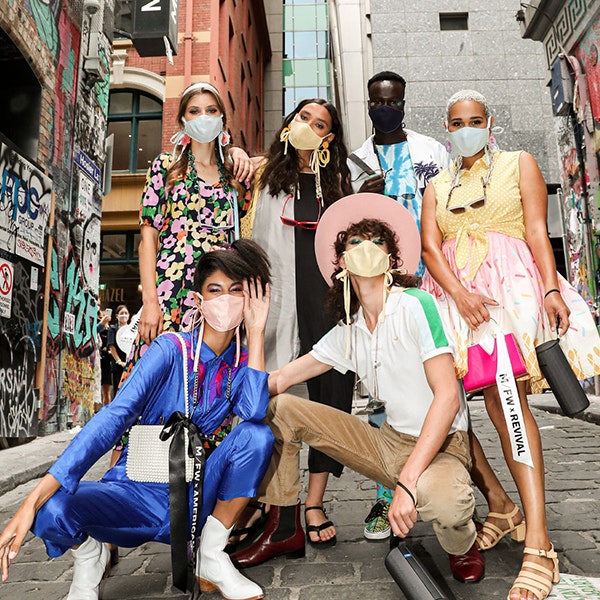 Six people standing in a Melbourne laneway wearing colourful fashion