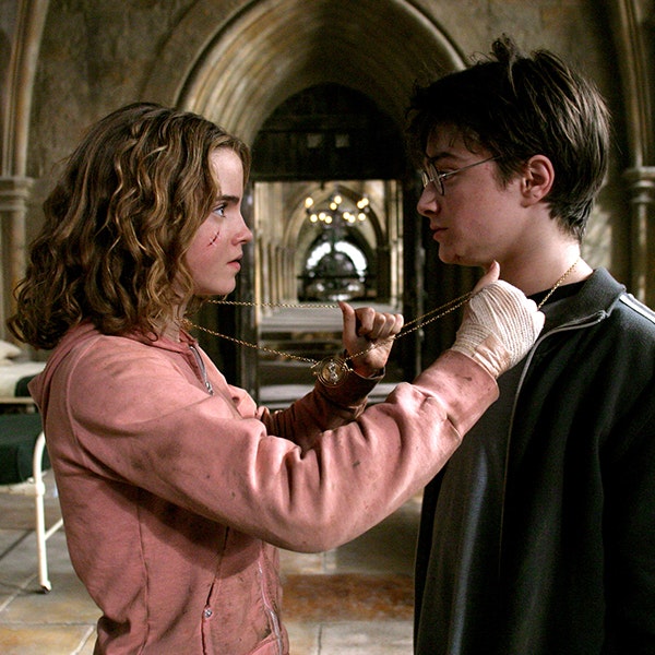 Hermione and Harry are facing each other as Hermione is about to use the Time Turner