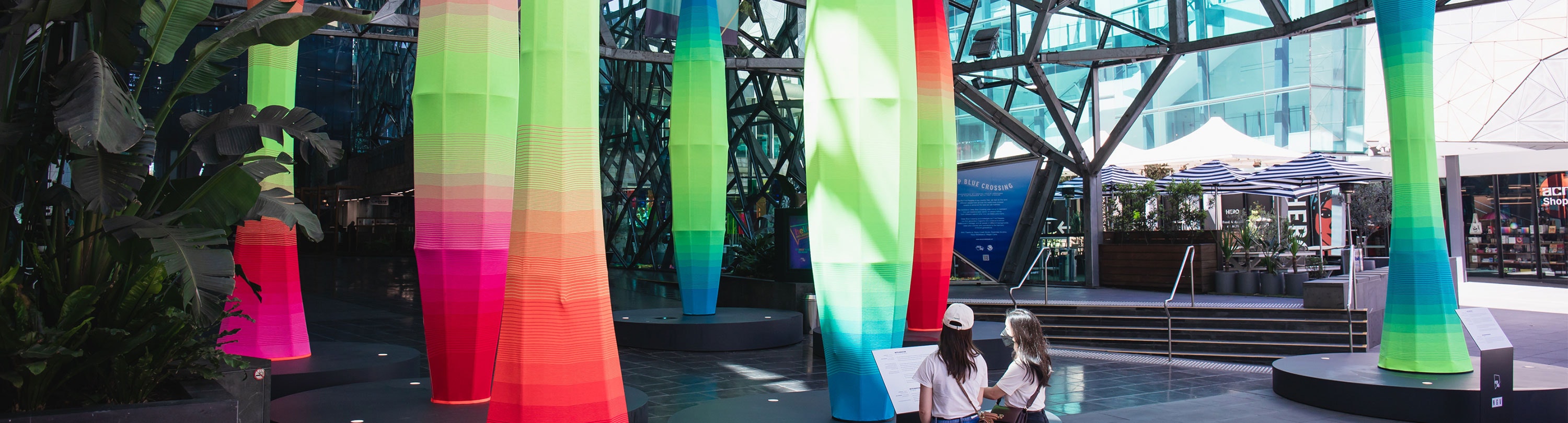 The brightly coloured Knitted Architecture installation at The Atrium in Fed Square