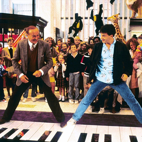 Tom Hanks is playing on the huge keyboard in the toy store in the movie Big