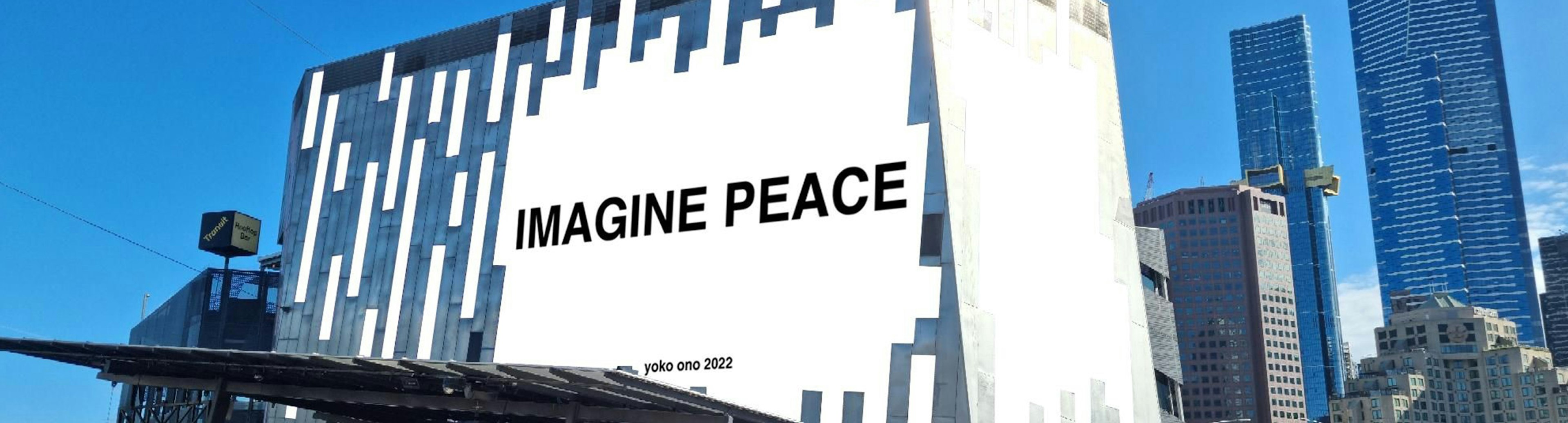 White Imagine Peace artwork on the big screen at Fed Square