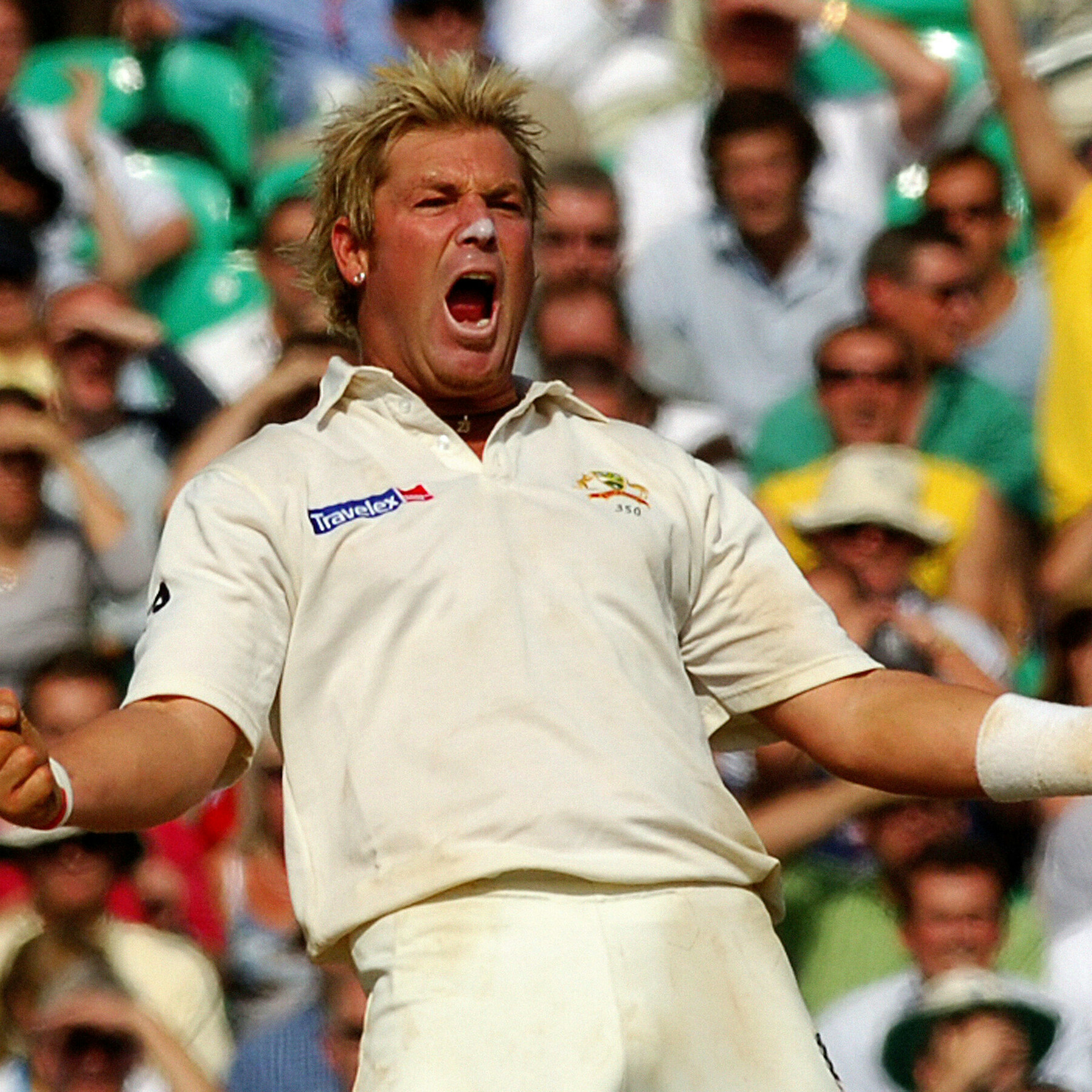 A photo of Shane Warne celebrating during a test cricket match