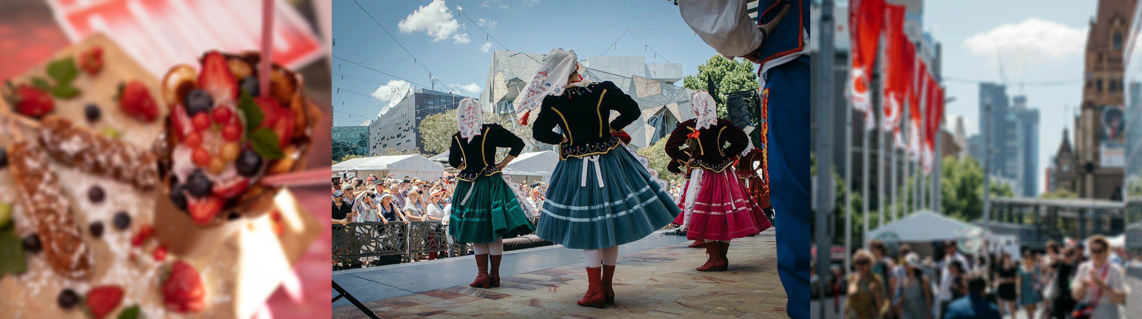 Women dressed in traditional Polish clothing are dancing on the stage at Fed Square, there are three women with their backs to the camera and their hands on their hips, it's a sunny day and the crowd is in the background of the shot