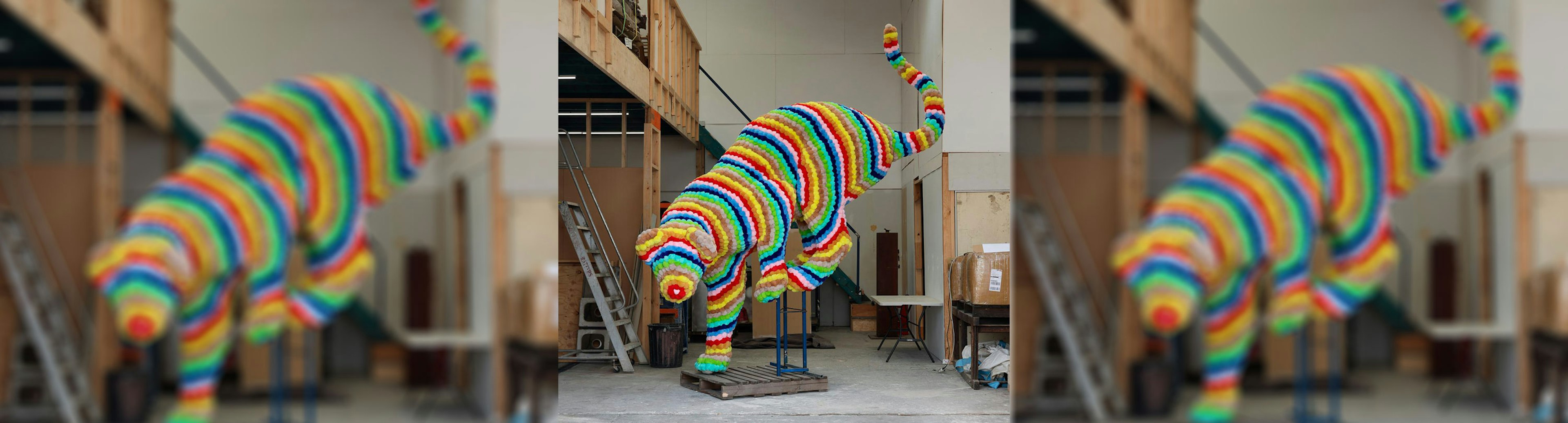 A sculpture of a cougar made from colourful polyurethane foam