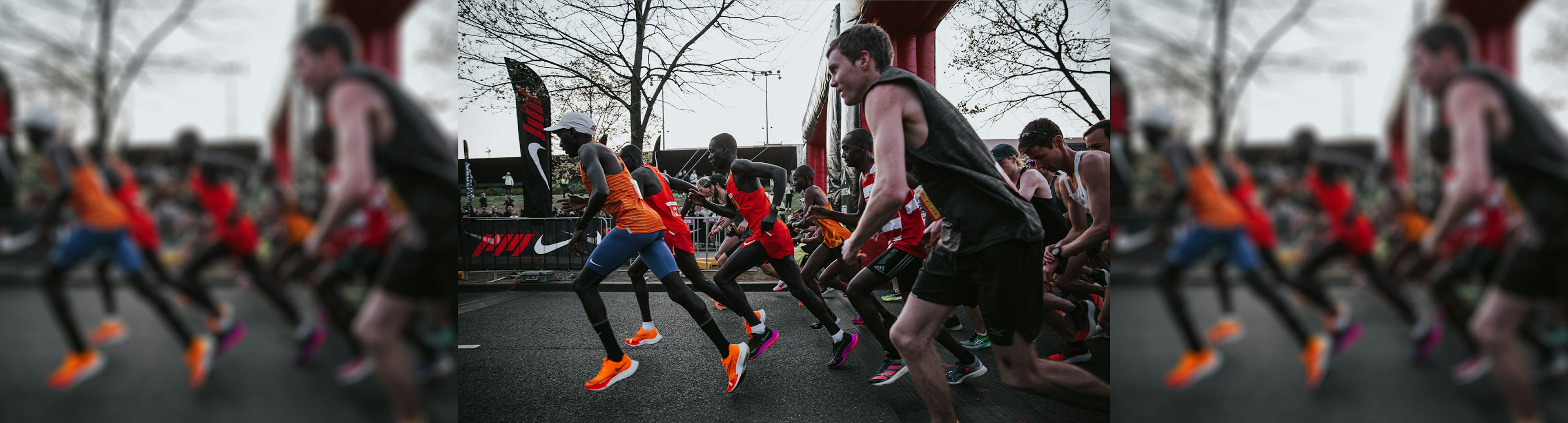 A group of runners taking off from the starting line of the Melbourne Marathon