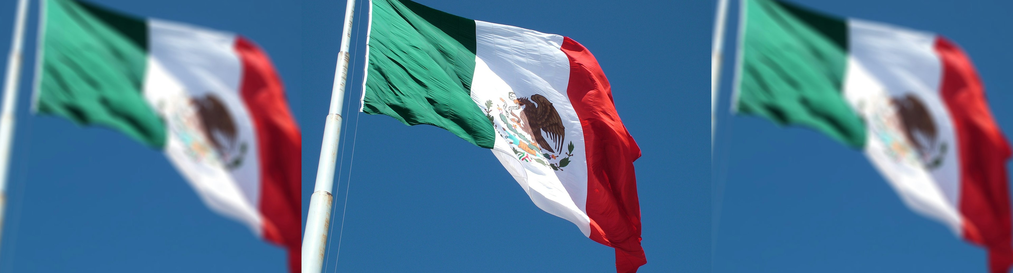 Mexican flag waving in the sky