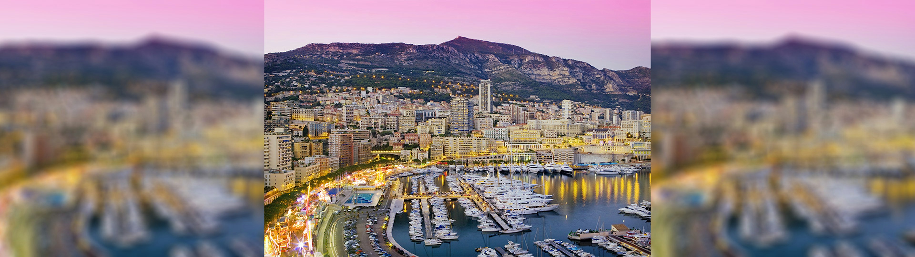 A photo of Monaco's city skyline at dusk