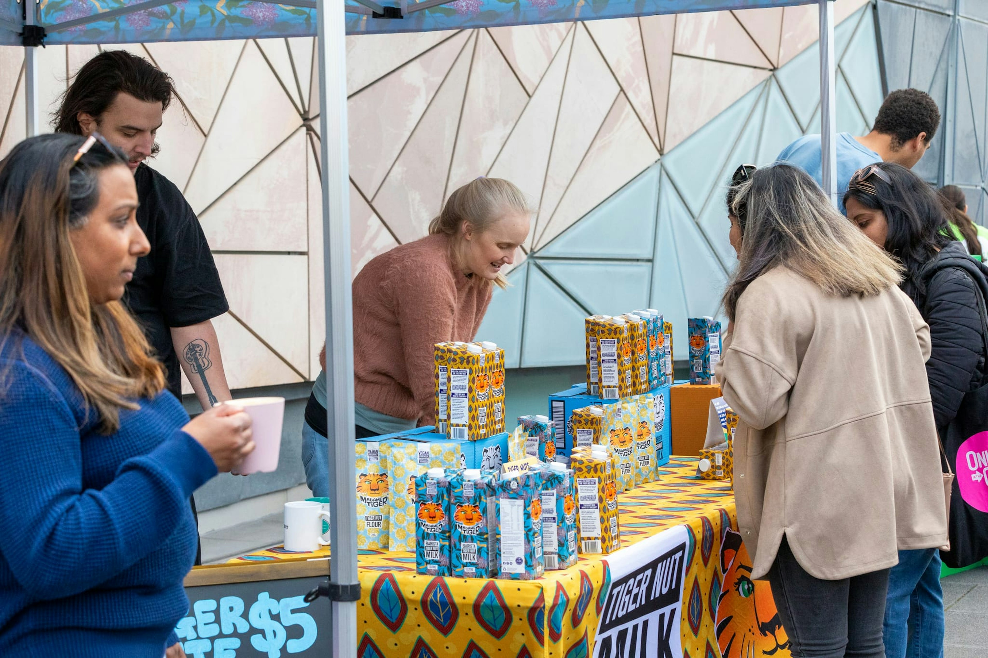 An outdoor stall selling tiger nut milk at Fed Square